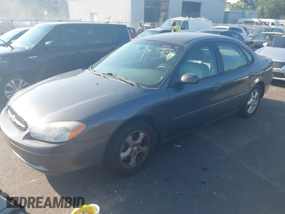 2002 Ford Taurus SES Standard z VIN 1FAFP55U22A172533, wystawiony jako IAAI lot #42680611 z przebiegiem 122 306 mil mil oraz . Historia ofert i sprzedaży dostępna na DreamBid. Obrazek 2.
