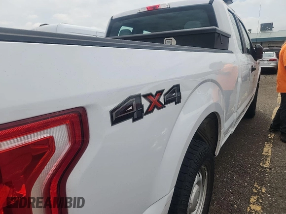 2017 Ford F-150 XL with VIN 1FTEX1E82HKD27618, listed as a IAAI auction lot 42796140 with 124,457 mi miles and . Bid and sale history available at DreamBid. Image 9.
