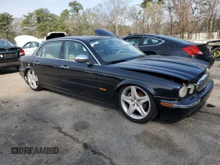 2005 Jaguar XJ Vanden Plas with VIN SAJWA82C55SG43618, listed as a Copart auction lot 47848515 with 237,224 mi miles and Salvage Title. Bid and sale history available at carsss.com. Image 4.