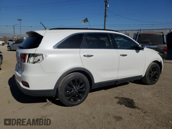 2019 Kia Sorento S with VIN 5XYPG4A51KG601460, listed as a Copart auction lot 80128124 with 34,719 mi miles and Salvage Title. Bid and sale history available at DreamBid. Image 3.