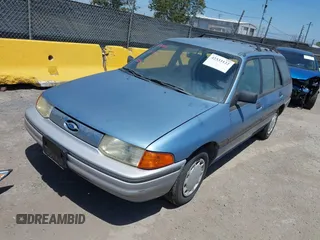 1991 Ford Escort z VIN 3FAPP15JXMR137136, wystawiony jako IAAI lot #42333122 z przebiegiem 23 312 mil mil oraz . Historia ofert i sprzedaży dostępna na DreamBid. Obrazek 2.