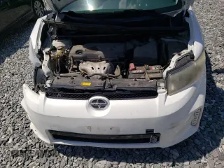 2014 Scion xB z VIN JTLZE4FE9EJ064207, wystawiony jako Copart lot #58377305 z przebiegiem 164 574 mil mil oraz Tytuł czysty. Historia ofert i sprzedaży dostępna na DreamBid. Obrazek 12.