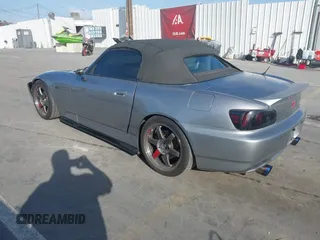 2004 Honda S2000 with VIN JHMAP21424T004079, listed as a IAAI auction lot 41711408 with 111,665 mi miles and . Bid and sale history available at DreamBid. Image 3.
