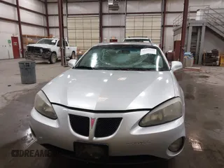 2004 Pontiac Grand Prix GT2 z VIN 2G2WS522641126247, wystawiony jako IAAI lot #42338014 z przebiegiem 236 735 mil mil oraz . Historia ofert i sprzedaży dostępna na DreamBid. Obrazek 12.