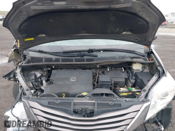 2015 Toyota Sienna LE AAS with VIN 5TDKK3DC1FS615090, listed as a IAAI auction lot 41965112 with 116,745 mi miles. Bid and sale history available at carsss.com. Image 10.