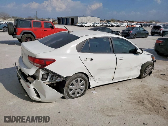 2023 Kia Rio S with VIN 3KPA24AD7PE549736, listed as a Copart auction lot 50428615 with 34,431 mi miles and Salvage Title. Bid and sale history available at carsss.com. Image 3.