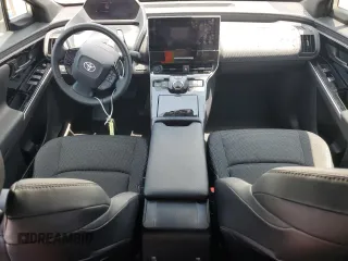 2024 Toyota bZ4X XLE with VIN JTMAAAAA1RA044367, listed as a Copart auction lot 59583075 with 10,890 mi miles and Salvage title. Bid and sale history available at DreamBid. Image 8.