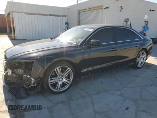 2016 Audi A8 Sport z VIN WAU43AFD5GN015399, wystawiony jako Copart lot #56144265 z przebiegiem 105 457 mil mil oraz Szkoda całkowita • Salvage title. Historia ofert i sprzedaży dostępna na DreamBid. Obrazek 1.