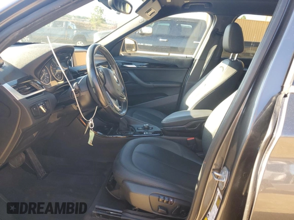 2016 BMW X1 xDrive28i z VIN WBXHT3Z30G4A47563, wystawiony jako Copart lot #50252555 z przebiegiem 99 975 mil mil oraz Szkoda całkowita • Salvage title. Historia ofert i sprzedaży dostępna na DreamBid. Obrazek 7.