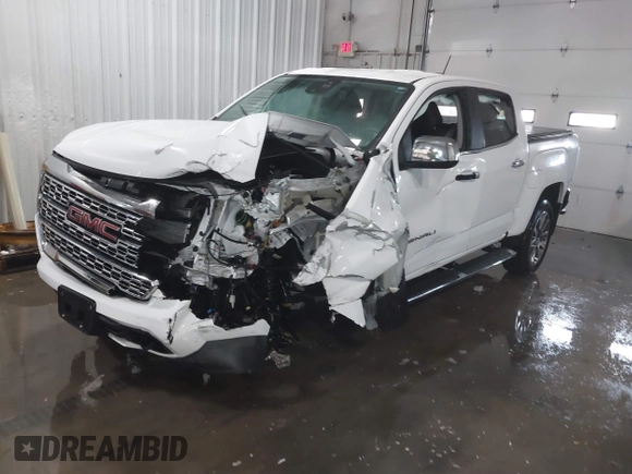 2021 GMC Canyon 4WD Denali with VIN 1GTG6EEN0M1229180, listed as a IAAI auction lot 41298304 with 55,865 mi miles. Bid and sale history available at carsss.com. Image 2.