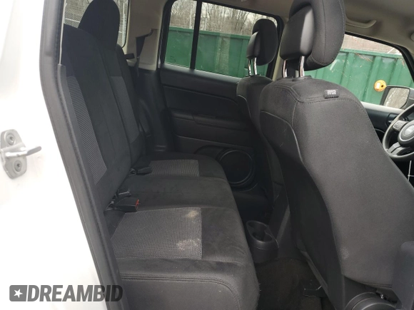 2014 Jeep Patriot Sport with VIN 1C4NJRBB2ED507410, listed as a Copart auction lot 49771915 with 149,883 mi miles and Salvage Title. Bid and sale history available at DreamBid. Image 12.