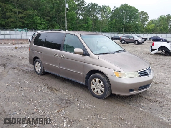 2004 Honda Odyssey EX-L z VIN 5FNRL189X4B036406, wystawiony jako IAAI lot #42368037 z przebiegiem 177 513 mil mil oraz . Historia ofert i sprzedaży dostępna na DreamBid. Obrazek 1.