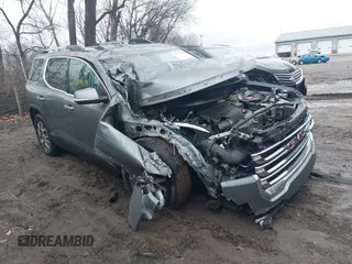 2022 GMC Acadia SLE z VIN 1GKKNKL41NZ117968, wystawiony jako IAAI lot #41519479 z przebiegiem 78 310 mil mil oraz . Historia ofert i sprzedaży dostępna na DreamBid. Obrazek 1.