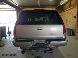 1999 Cadillac Escalade with VIN 1GYEK13R4XR415113, listed as a Copart auction lot 53036465 with 0 mi miles and Salvage Title. Bid and sale history available at carsss.com. Image 6.