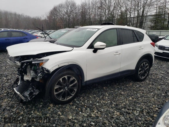 2016 Mazda CX-5 Grand Touring with VIN JM3KE4DY8G0728765, listed as a Copart auction lot 51625825 with 141,681 mi miles and Salvage Title. Bid and sale history available at carsss.com. Image 1.