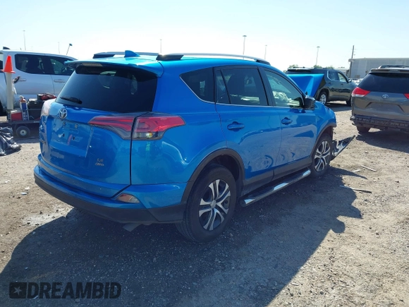 2016 Toyota RAV4 LE with VIN JTMBFREV8GD197535, listed as a IAAI auction lot 41866506 with 81,416 mi miles. Bid and sale history available at carsss.com. Image 4.