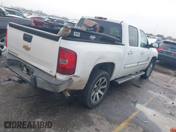 2013 Chevrolet Silverado 1500 LT with VIN 3GCPCSE02DG170890, listed as a IAAI auction lot 41462129 with 140,958 mi miles and . Bid and sale history available at DreamBid. Image 4.