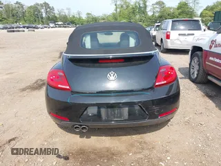 2013 Volkswagen Beetle 2.5L z VIN 3VW5X7AT5DM805978, wystawiony jako IAAI lot #42429397 z przebiegiem 62 408 mil mil oraz . Historia ofert i sprzedaży dostępna na DreamBid. Obrazek 15.