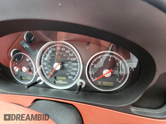 2004 Chrysler Crossfire z VIN 1C3AN69L14X009846, wystawiony jako Copart lot #72343324 z przebiegiem Nie podano mil oraz Szkody całkowita. Historia ofert i sprzedaży dostępna na DreamBid. Obrazek 6.