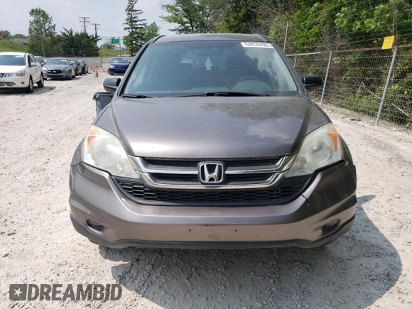 2011 Honda CR-V SE z VIN 5J6RE4H44BL057188, wystawiony jako Copart lot #59426285 z przebiegiem 217 593 mil mil oraz Czysty tytuł • Clean title. Historia ofert i sprzedaży dostępna na DreamBid. Obrazek 5.