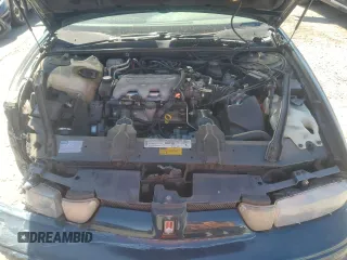 1997 Oldsmobile Cutlass Supreme S z VIN 1G3WH52M7VF349340, wystawiony jako Copart lot #50806565 z przebiegiem 1 254 585 mil mil oraz Szkody całkowita. Historia ofert i sprzedaży dostępna na DreamBid. Obrazek 11.