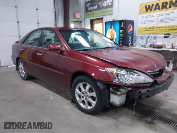 2005 Toyota Camry LE with VIN 4T1BF30KX5U099450, listed as a IAAI auction lot 41670099 with Not Provided miles and . Bid and sale history available at DreamBid. Image 1.