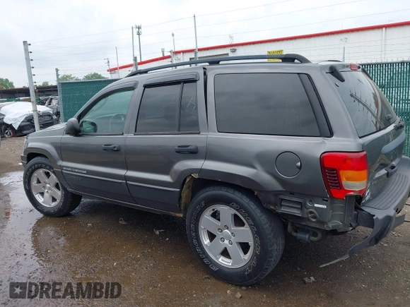 2003 Jeep Grand Cherokee Laredo z VIN 1J4GW48S73C545863, wystawiony jako IAAI lot #42222247 z przebiegiem 128 529 mil mil oraz . Historia ofert i sprzedaży dostępna na DreamBid. Obrazek 14.