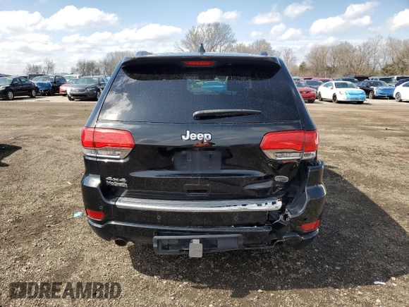 2017 Jeep Grand Cherokee Overland z VIN 1C4RJFCG7HC727517, wystawiony jako Copart lot #51658665 z przebiegiem 170 184 mil mil oraz Czysty tytuł • Clean title. Historia ofert i sprzedaży dostępna na DreamBid. Obrazek 6.