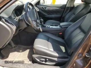 2015 Infiniti Q50 Premium с VIN JN1BV7AR7FM421900, выставлен на аукционе Copart как лот 58426305 с пробегом 125 467 миль миль и Списание • Salvage title. История ставок и продаж доступна на DreamBid. Изображение 7.