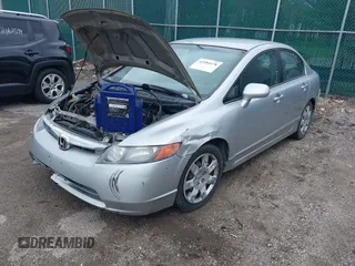 2006 Honda Civic LX z VIN 1HGFA16596L032275, wystawiony jako IAAI lot #42184178 z przebiegiem 220 657 mil mil oraz . Historia ofert i sprzedaży dostępna na DreamBid. Obrazek 2.