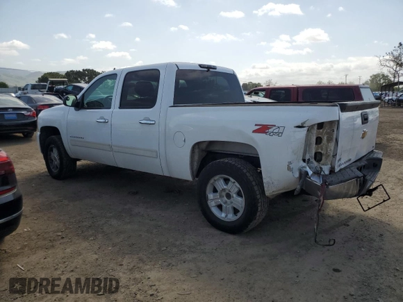 2011 Chevrolet Silverado 1500 LT with VIN 3GCPKSE37BG112705, listed as a Copart auction lot 52622045 with 173,202 mi miles and Salvage Title. Bid and sale history available at DreamBid. Image 2.