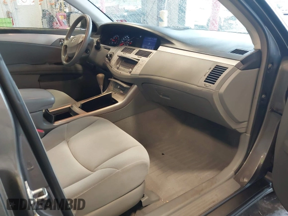 2007 Toyota Avalon XL z VIN 4T1BK36B17U193545, wystawiony jako IAAI lot #42202391 z przebiegiem 98 388 mil mil oraz . Historia ofert i sprzedaży dostępna na DreamBid. Obrazek 5.