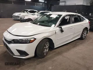 2023 Honda Civic Sedan LX with VIN 2HGFE2F20PH571270, listed as a IAAI auction lot 41752986 with 12,214 mi miles. Bid and sale history available at carsss.com. Image 2.