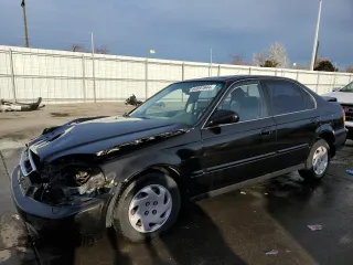 1997 Honda Civic EX with VIN 1HGEJ8646VL033197, listed as a Copart auction lot 84891944 with 0 mi miles and Salvage Title. Bid and sale history available at carsss.com. Image 1.