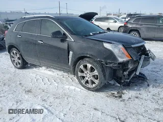 2012 Cadillac SRX Performance Collection z VIN 3GYFNEE33CS584476, wystawiony jako IAAI lot #41431886 z przebiegiem 93 919 mil mil oraz . Historia ofert i sprzedaży dostępna na DreamBid. Obrazek 1.