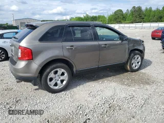 2014 Ford Edge SEL z VIN 2FMDK4JC7EBA47264, wystawiony jako Copart lot #54201255 z przebiegiem 135 408 mil mil oraz Szkoda całkowita • Salvage title. Historia ofert i sprzedaży dostępna na DreamBid. Obrazek 3.