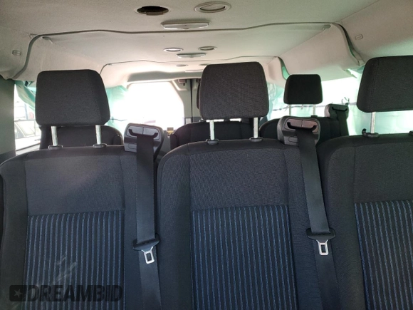 2019 Ford Transit Passenger XL z VIN 1FBZX2ZM5KKA77799, wystawiony jako Copart lot #86916184 z przebiegiem 152 833 mil mil oraz Szkody całkowita. Historia ofert i sprzedaży dostępna na DreamBid. Obrazek 10.