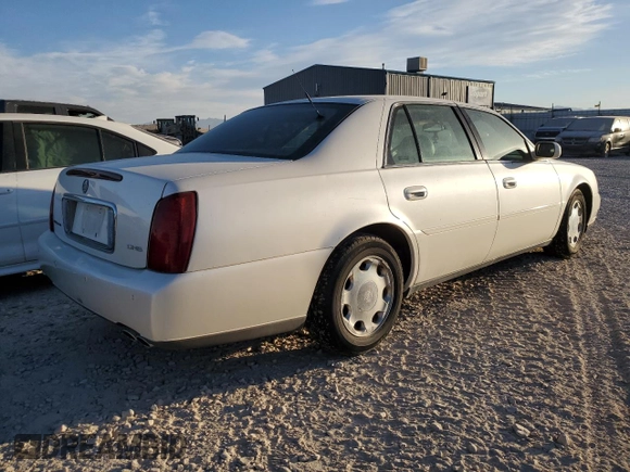 2001 Cadillac DeVille DHS z VIN 1G6KE57Y31U229255, wystawiony jako Copart lot #75101214 z przebiegiem 141 187 mil mil oraz Czysty tytuł • Clean title. Historia ofert i sprzedaży dostępna na DreamBid. Obrazek 3.
