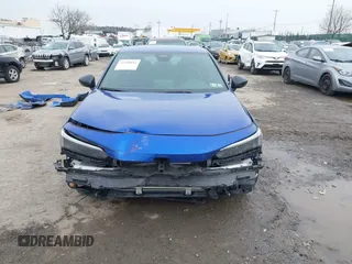 2023 Honda Civic Sport z VIN 2HGFE2F56PH502559, wystawiony jako IAAI lot #41558054 z przebiegiem 48 961 mil mil oraz . Historia ofert i sprzedaży dostępna na DreamBid. Obrazek 6.