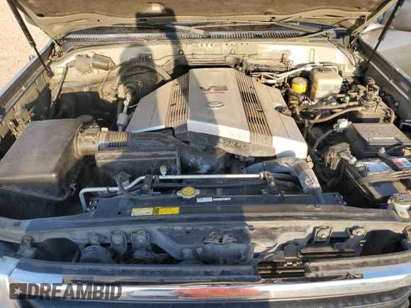 2000 Toyota Land Cruiser z VIN JT3HT05J9Y0123937, wystawiony jako Copart lot #56599145 z przebiegiem 132 262 mil mil oraz Szkoda całkowita • Salvage title. Historia ofert i sprzedaży dostępna na DreamBid. Obrazek 11.