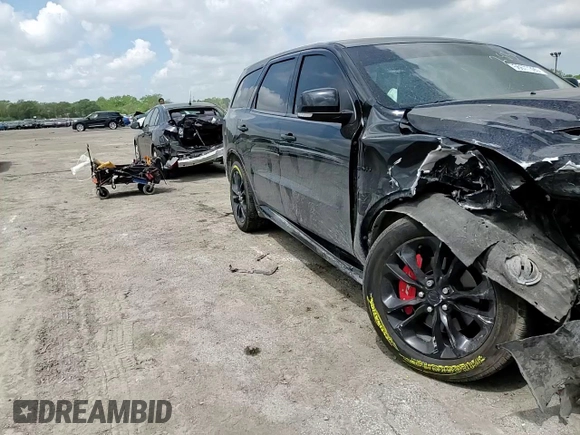 2020 Dodge Durango R/T with VIN 1C4SDJCT9LC212830, listed as a Copart auction lot 56677395 with 95,958 mi miles and Salvage title. Bid and sale history available at DreamBid. Image 14.