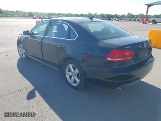 2013 Volkswagen Passat SE w/Sunroof with VIN 1VWBP7A3XDC113767, listed as a IAAI auction lot 41987892 with 112,748 mi miles. Bid and sale history available at carsss.com. Image 3.