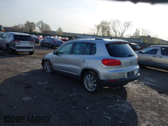 2013 Volkswagen Tiguan S with VIN WVGAV3AX0DW572915, listed as a IAAI auction lot 41937763 with 65,136 mi miles and . Bid and sale history available at DreamBid. Image 3.
