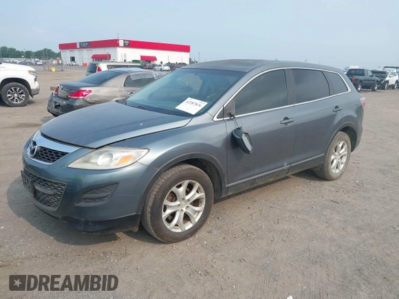 2011 Mazda CX-9 Touring with VIN JM3TB2CA4B0322612, listed as a IAAI auction lot 42387836 with 180,438 mi miles and . Bid and sale history available at DreamBid. Image 2.