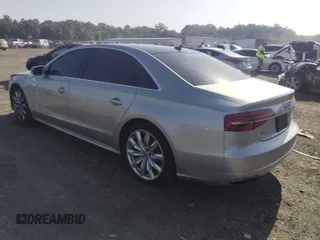 2017 Audi A8 with VIN WAU44AFD3HN014802, listed as a IAAI auction lot 42573537 with 121,096 mi miles and . Bid and sale history available at DreamBid. Image 3.