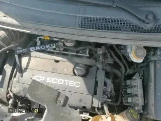 2018 Chevrolet Sonic LT z VIN 1G1JG6SH2J4103798, wystawiony jako Copart lot #57326595 z przebiegiem 123 723 mil mil oraz Szkoda całkowita • Salvage title. Historia ofert i sprzedaży dostępna na DreamBid. Obrazek 13.