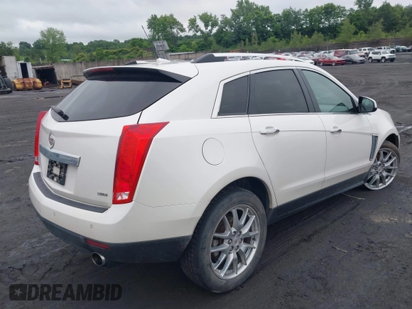 2013 Cadillac SRX Performance Collection with VIN 3GYFNHE34DS628486, listed as a IAAI auction lot 42530124 with 76,778 mi miles and . Bid and sale history available at DreamBid. Image 4.