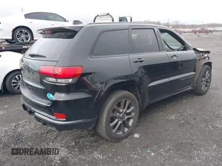 2019 Jeep Grand Cherokee High Altitude with VIN 1C4RJFCG9KC566594, listed as a IAAI auction lot 41128793 with 96,244 mi miles and . Bid and sale history available at DreamBid. Image 4.