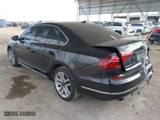 2017 Volkswagen Passat 1.8T SE w/Technology with VIN 1VWGT7A36HC074702, listed as a IAAI auction lot 41805024 with 124,857 mi miles. Bid and sale history available at carsss.com. Image 3.