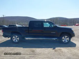 2015 Toyota Tacoma with VIN 3TMMU4FN7FM085666, listed as a IAAI auction lot 42051241 with 224,513 mi miles and . Bid and sale history available at DreamBid. Image 13.